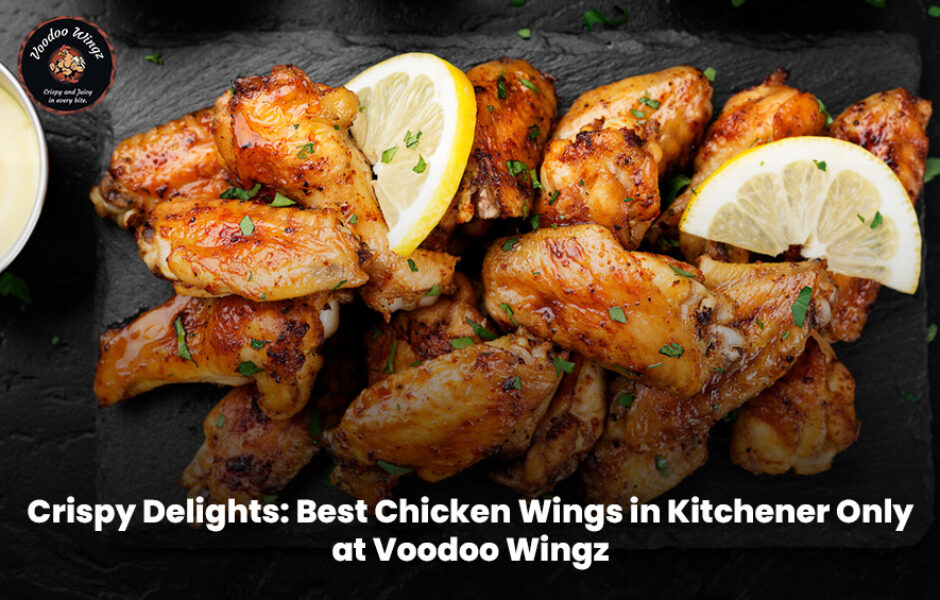 Crispy golden chicken wings served with sauces at Voodoo Wingz in Kitchener