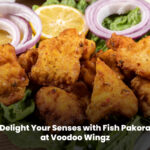 Fish Pakora served hot and crispy at Voodoo Wingz on a plate